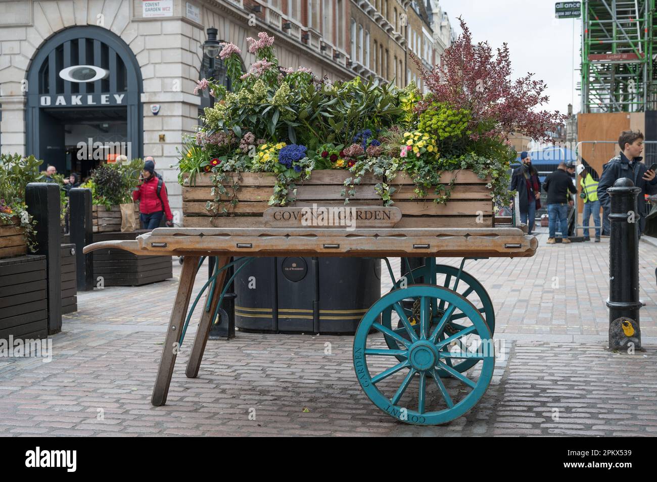 Floral display on a traditional coster market barrow. The Piazza