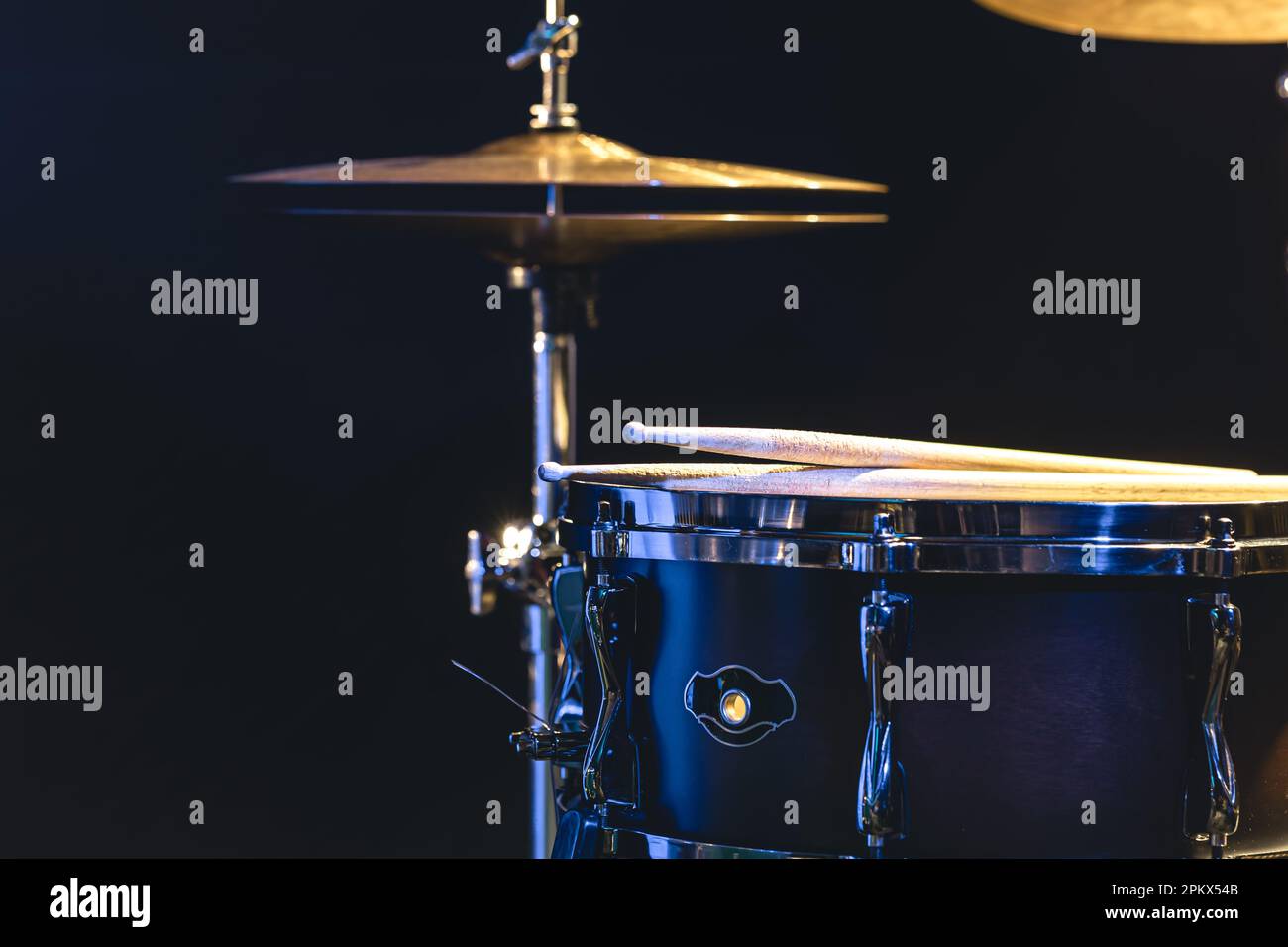 Snare drum and cymbals on a black background Stock Photo Alamy