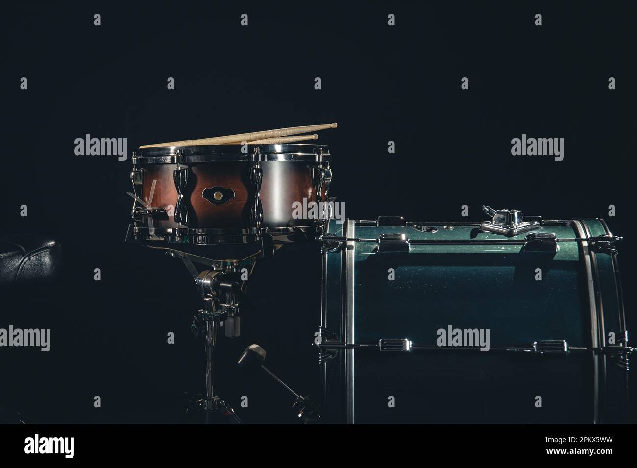 Black hands on drum kit hi-res stock photography and images - Alamy