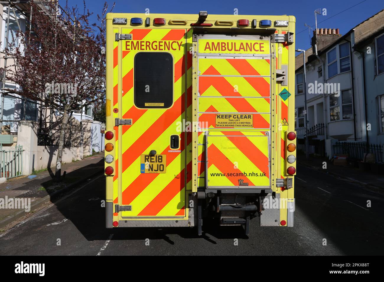 An ambulance responds to an emergency in a street in Brighton Stock Photo