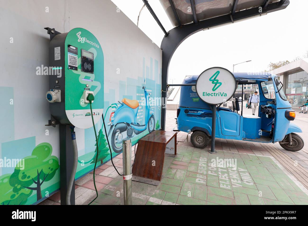 Electric car charging station in South Extension II, Delhi, India Stock