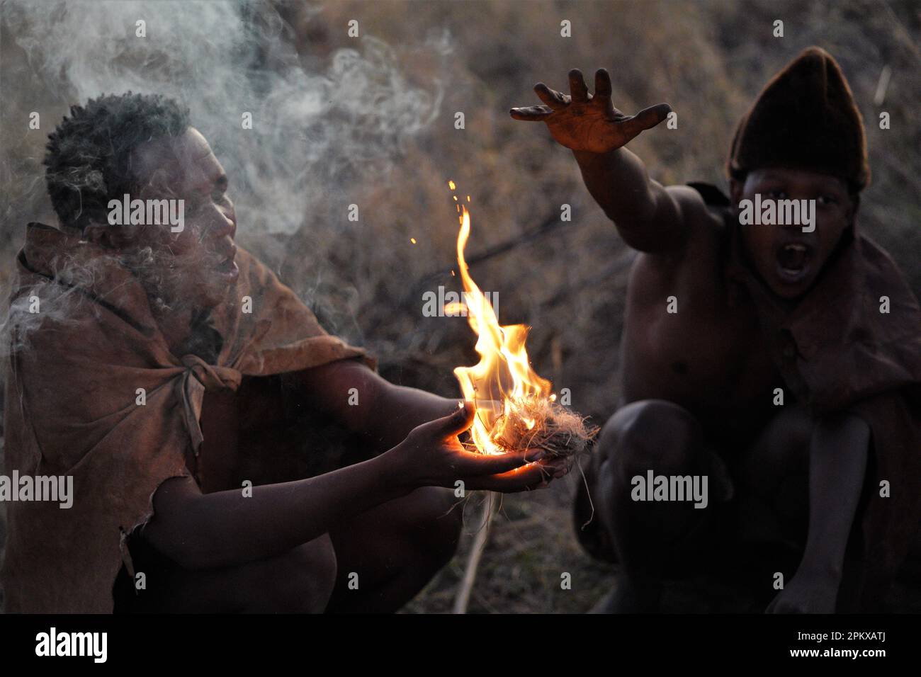 San Bushmen showing traditional way of making fire Stock Photo - Alamy