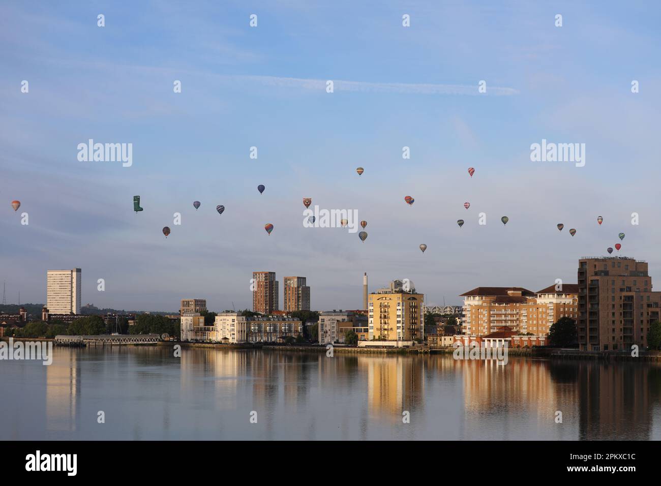Hot air balloons soar past the south east London skyline and over the