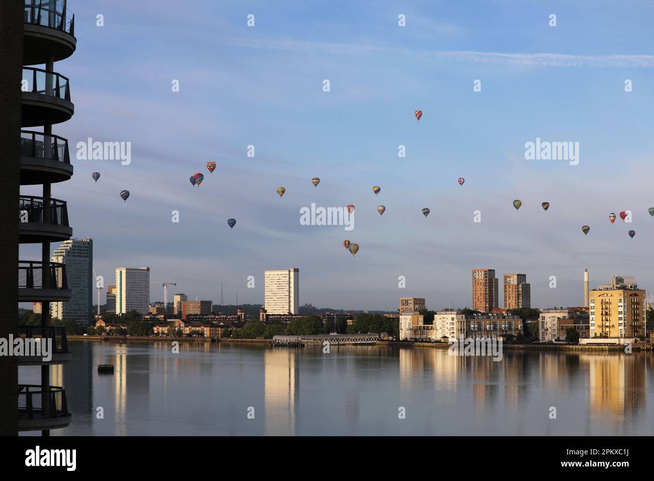 Hot air balloons soar past the south east London skyline and over the