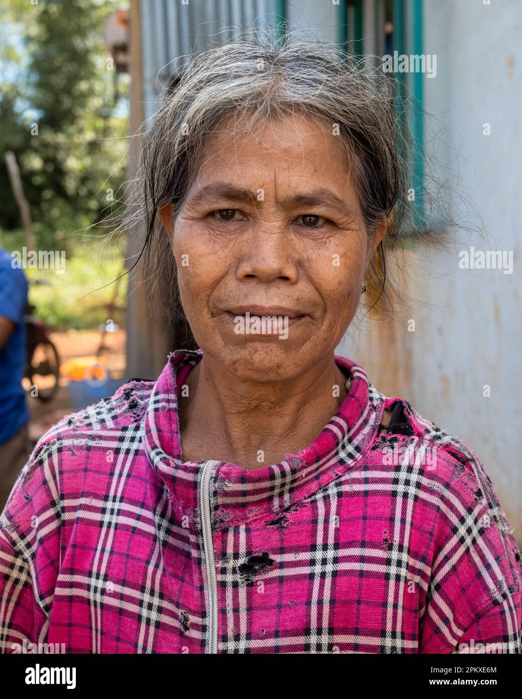 A middle-aged woman from the Jerai ethnic minority in her village in ...