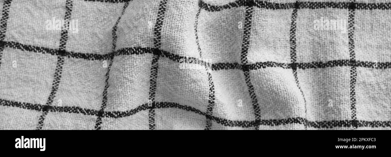 Classic black and white checkered kitchen towel texture banner