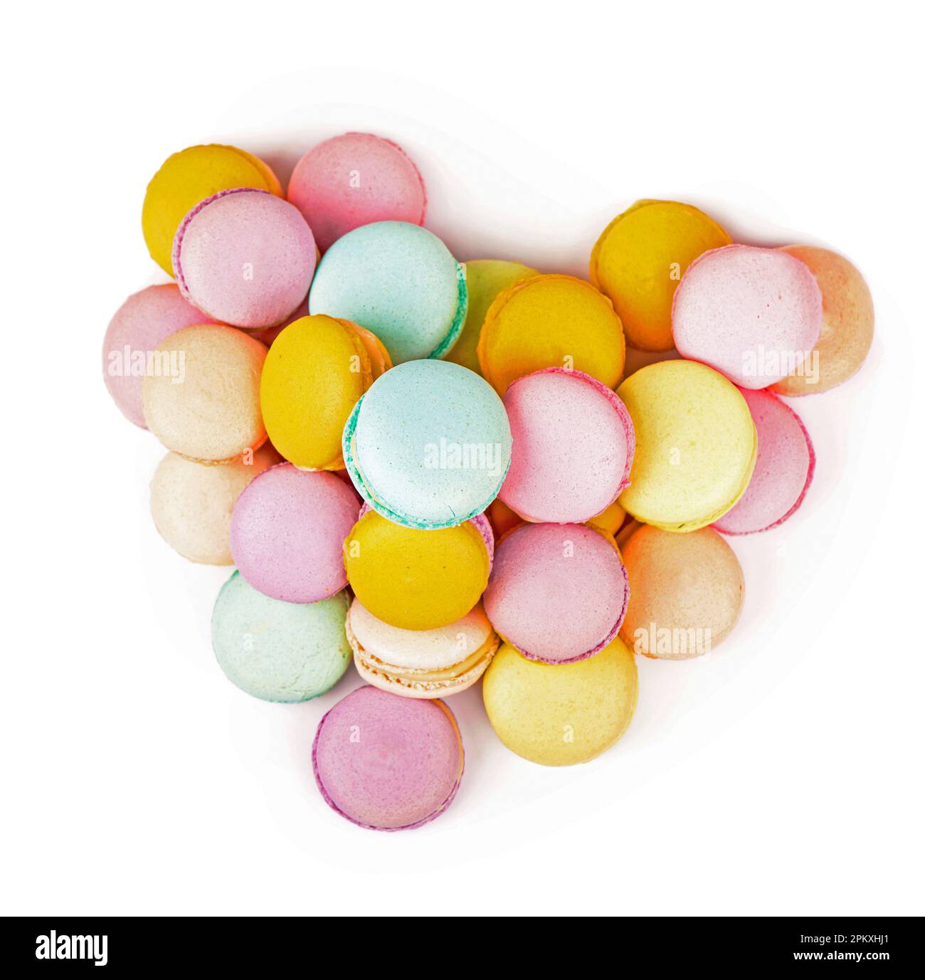 Delicious three multicolored macaroon on a white Stock Photo