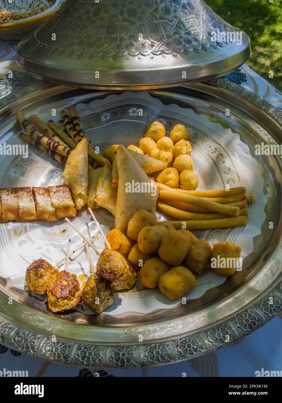 Moroccan appetisers in a silver tagine. La Mamunia, Motril, Granada, Spain.  Food. Stock Photo