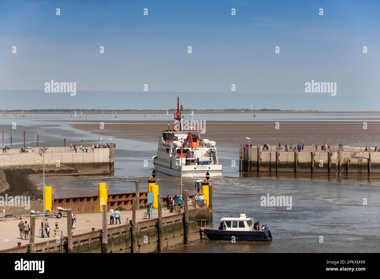 Ferry Spiekeroog I, leaving the harbour, Neuharlingersiel, East Frisia, Lower Saxony, Germany Stock Photo