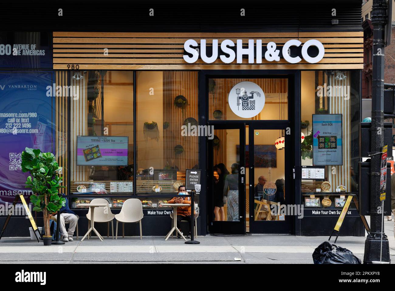 Sushi & Co, 980 6th Ave, New York, NYC storefront photo of a sushi fast casual Japanese restaurant in Midtown Manhattan. Stock Photo