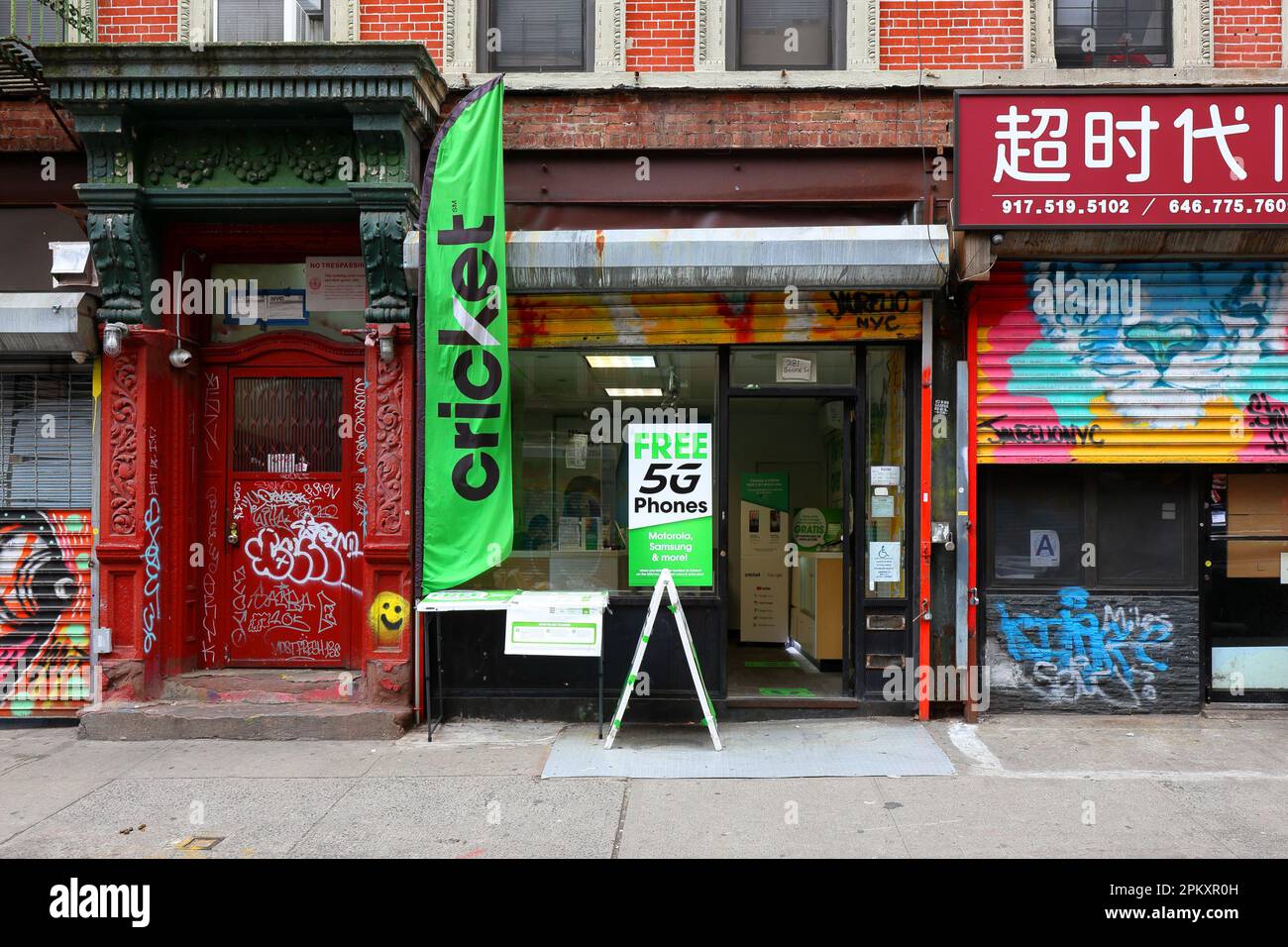 A Cricket Wireless prepaid cell phone wireless service provider in the Manhattan's Lower East Side in New York City. Stock Photo