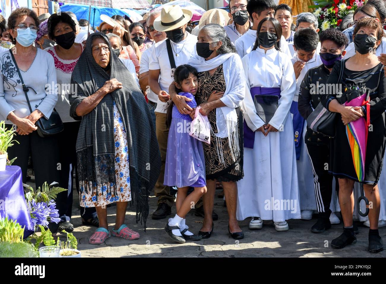 Parish members listening to prayers n front of neighbourhood altears during the Good Friday Silent procession, City of Oaxaca, Mexico Stock Photo