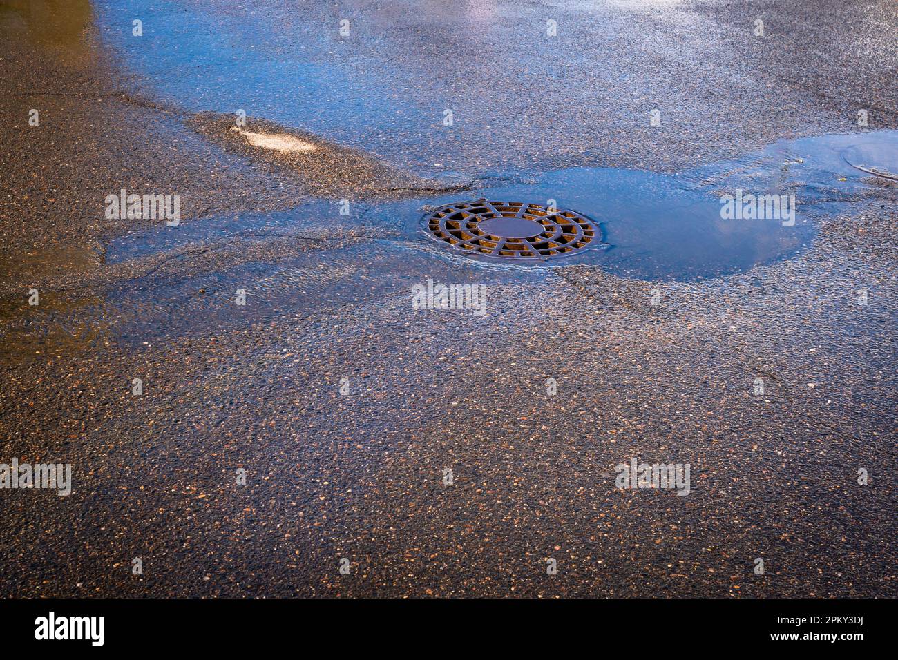 Waste from the oil industry flows down the storm drain with rainwater