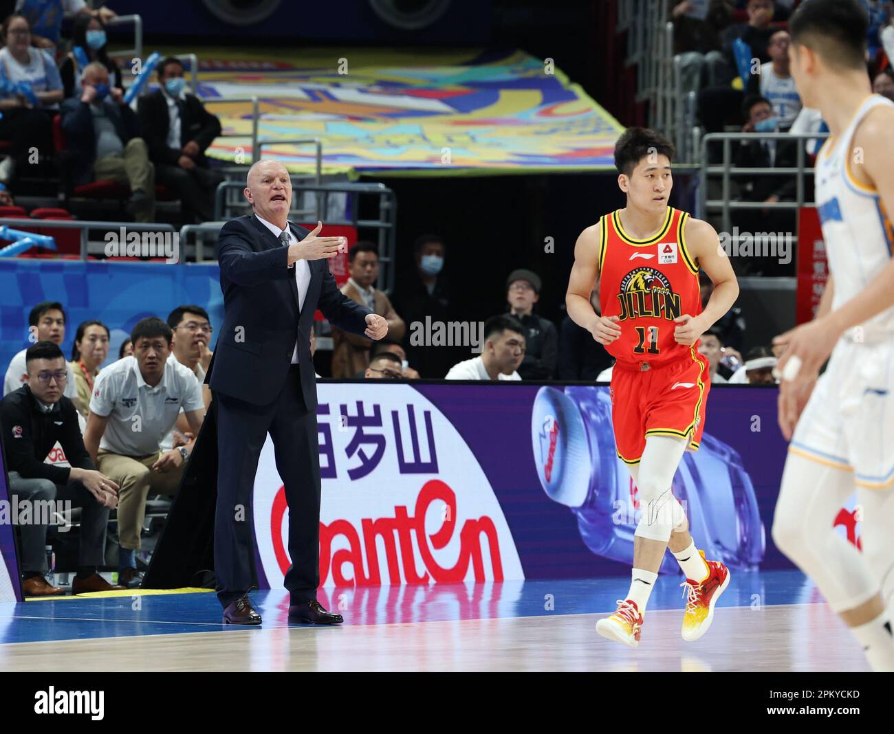 Beijing, China. 10th Apr, 2023. Ernest Raden (L), coach of Beijing Ducks, gestures during the playoff 1st round match between Beijing Ducks and Jilin Northeast Tigers at the 2022-2023 season of the Chinese Basketball Association (CBA) league in Beijing, capital of China, April 10, 2023. Credit: Zhang Chenlin/Xinhua/Alamy Live News Stock Photo