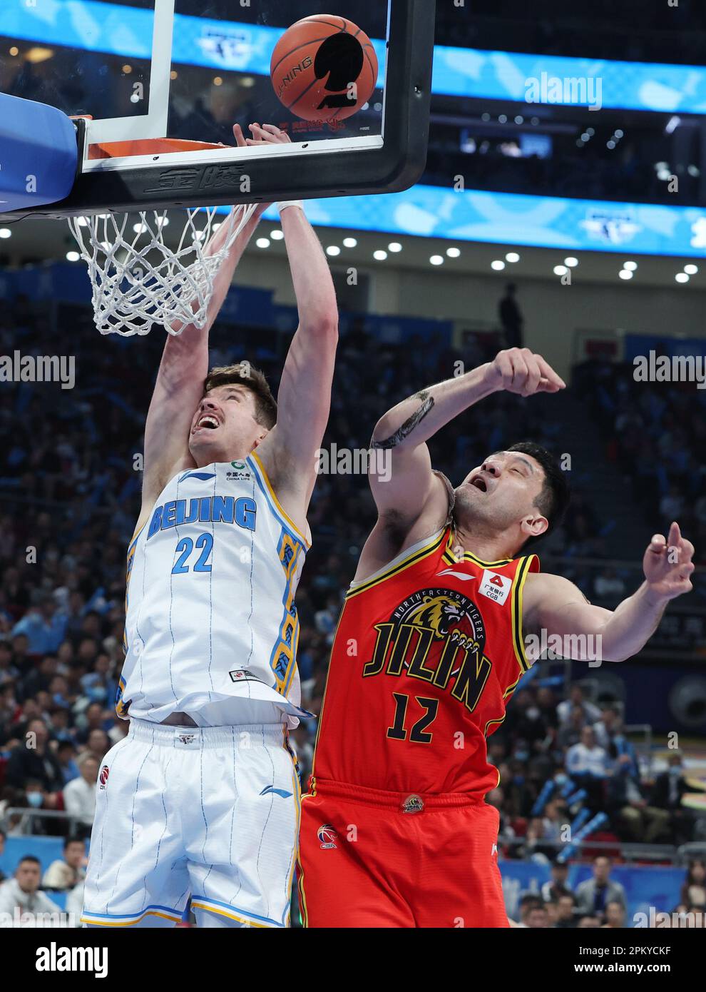 Beijing, China. 10th Apr, 2023. Ty Jacob Leaf (L) of Beijing Ducks vies for the ball during the playoff 1st round match between Beijing Ducks and Jilin Northeast Tigers at the 2022-2023 season of the Chinese Basketball Association (CBA) league in Beijing, capital of China, April 10, 2023. Credit: Zhang Chenlin/Xinhua/Alamy Live News Stock Photo