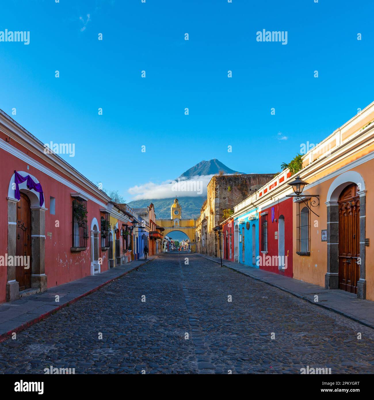 Antigua city at sunrise with Agua volcano and Santa Catalina arch