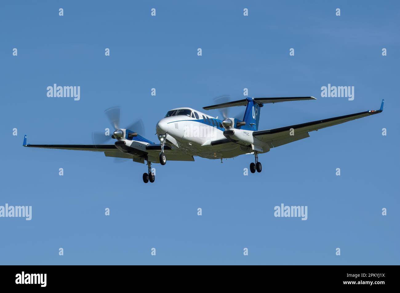 Small propeller plane shown approaching for landing at Bob Hope Airport