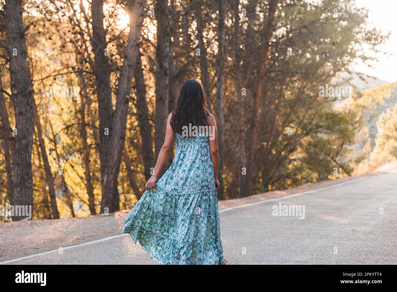 Woman walking barefoot street hi-res stock photography and images - Alamy