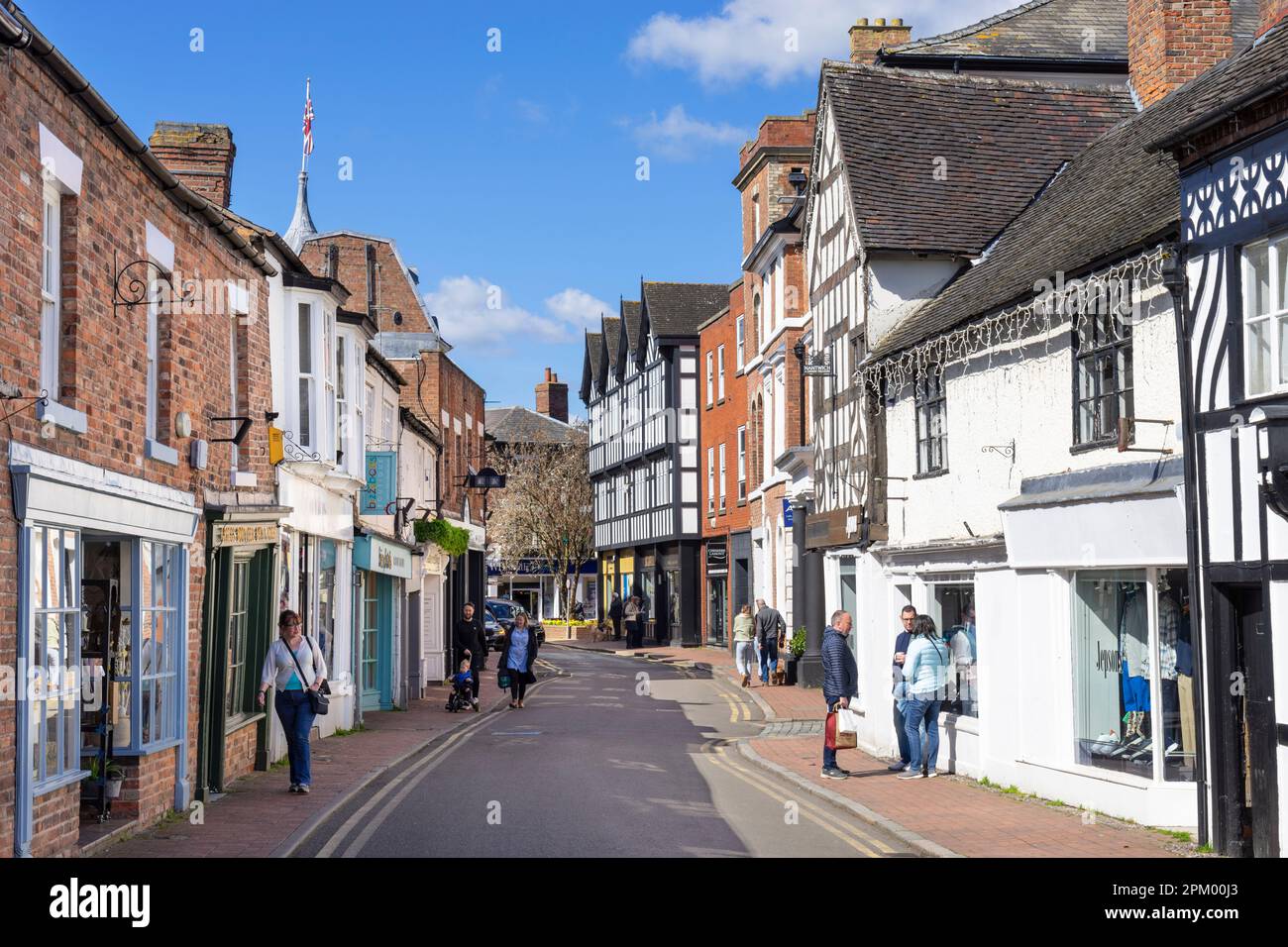 Nantwich Cheshire East - Nantwich Hospital street with half timbered buildings and people shopping Nantwich Cheshire England UK GB Europe Stock Photo