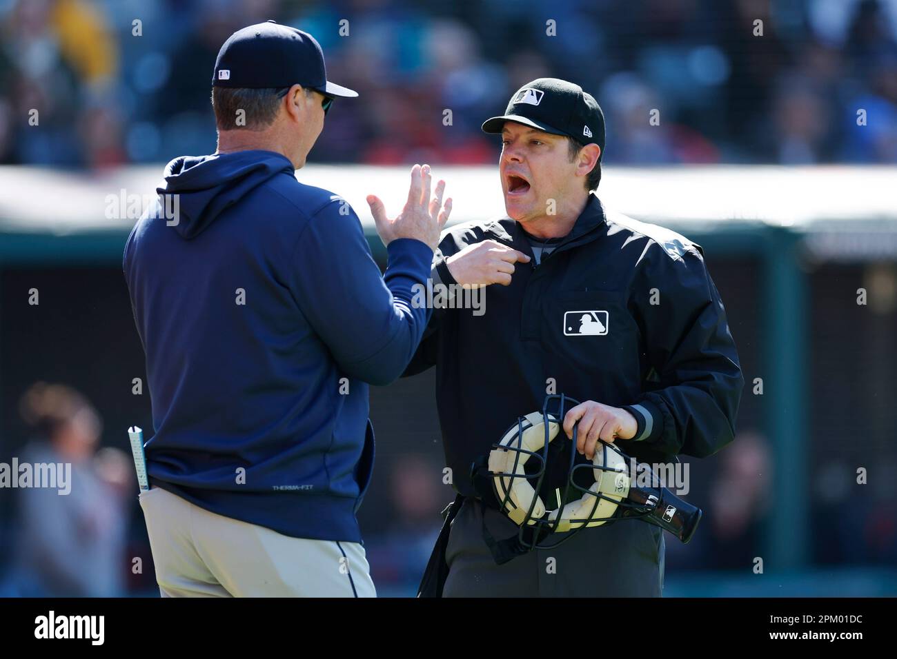 Pittsburgh Pirates Francisco Cervelli (29) and home plate umpire DJ  Reyburn, left, react after both being hit by a pitch as Toronto Blue Jays  catcher Dioner Navarro, centre, looks to help during