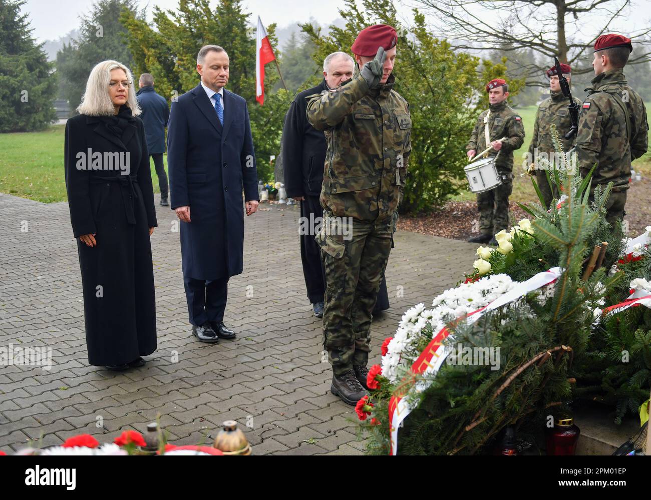 Malgorzata Wassermann (daughter of Zbigniew Wassermann) and the President of Poland Andrzej Duda seen at the grave of Zbigniew Wassermann, during the 13th anniversary Cemetery of his death in Bielany, Krakow. President Andrzej Duda attends the 13th anniversary of the government plane (TU154M) crash in Smolensk. The delegation led by President Lech Kaczynski died on the way to the ceremony in Katyn on April 10, 2010. 96 people were killed, including the President of the Republic of Poland Lech Kaczynski, and his wife, MPs, ministers, senators, military commanders, and others. Stock Photo