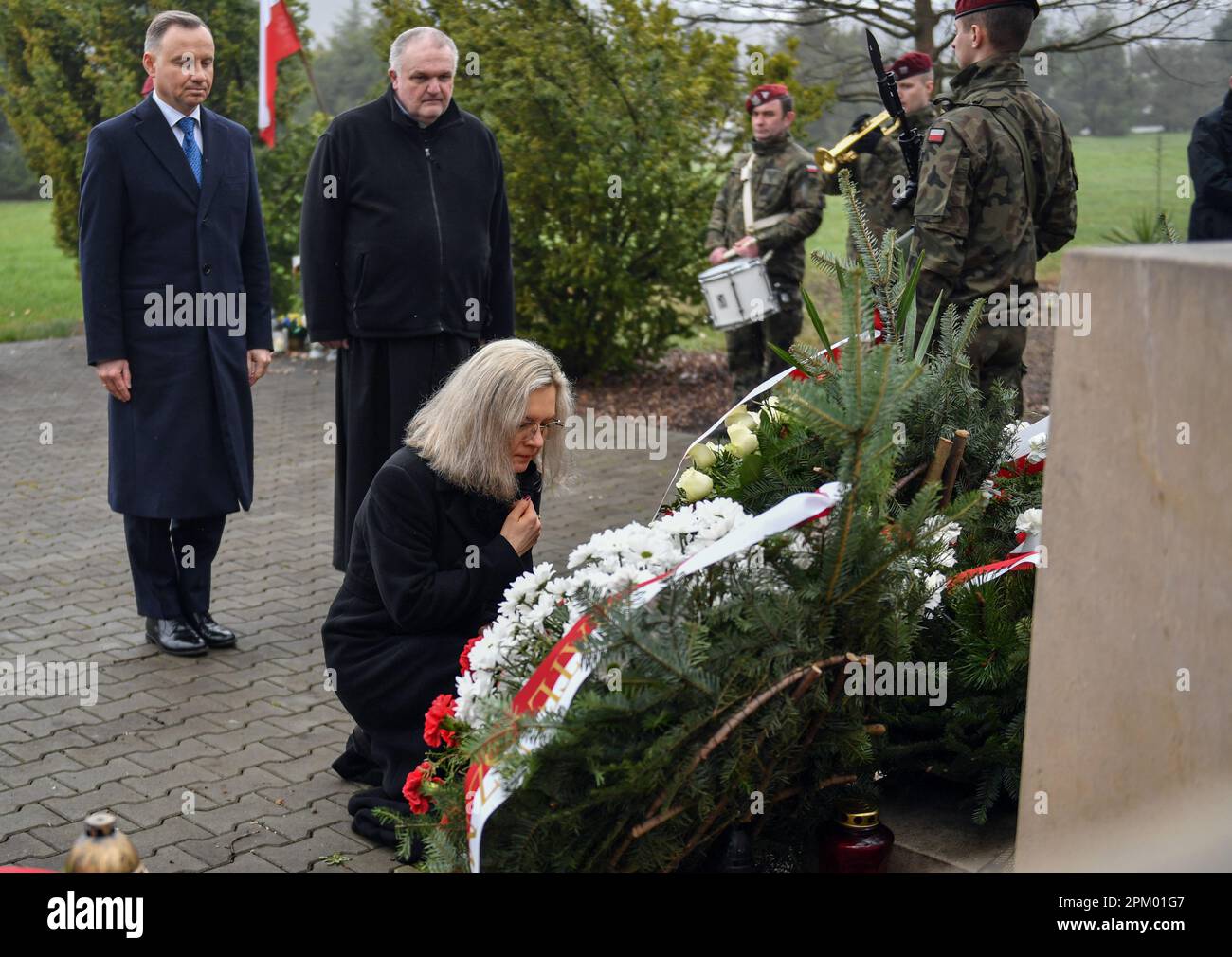 Malgorzata Wassermann (daughter of Zbigniew Wassermann) and the President of Poland Andrzej Duda seen at the grave of Zbigniew Wassermann, during the 13th anniversary Cemetery of his death in Bielany, Krakow. President Andrzej Duda attends the 13th anniversary of the government plane (TU154M) crash in Smolensk. The delegation led by President Lech Kaczynski died on the way to the ceremony in Katyn on April 10, 2010. 96 people were killed, including the President of the Republic of Poland Lech Kaczynski, and his wife, MPs, ministers, senators, military commanders, and others. Stock Photo
