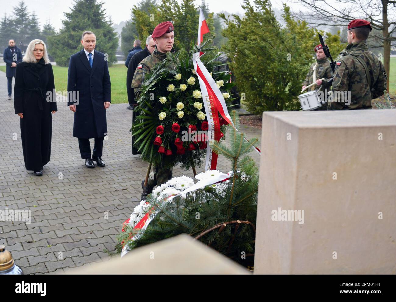 Malgorzata Wassermann (daughter of Zbigniew Wassermann) and the President of Poland Andrzej Duda seen at the grave of Zbigniew Wassermann, during the 13th anniversary Cemetery of his death in Bielany, Krakow. President Andrzej Duda attends the 13th anniversary of the government plane (TU154M) crash in Smolensk. The delegation led by President Lech Kaczynski died on the way to the ceremony in Katyn on April 10, 2010. 96 people were killed, including the President of the Republic of Poland Lech Kaczynski, and his wife, MPs, ministers, senators, military commanders, and others. (Photo by Alex Bon Stock Photo
