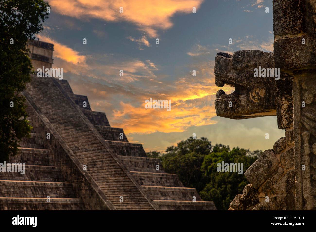 Enjoying the pyramid of Chichen itza from the platform of eagles and jaguars with the god Kukulcan, the feathered serpent of the Mayan civilization. Stock Photo