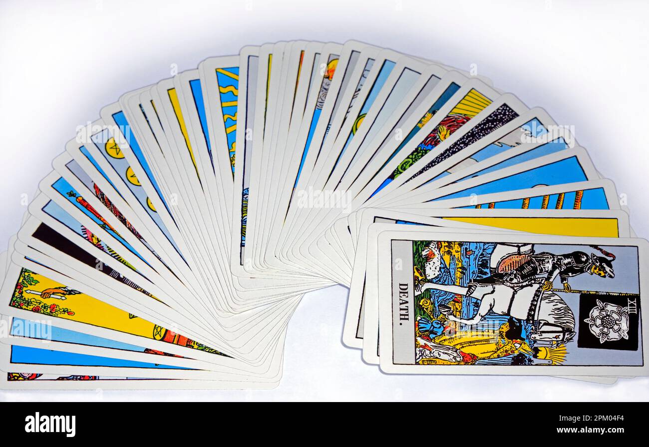 Tarot cards arranged in a fan shape with the Death card visible Stock Photo