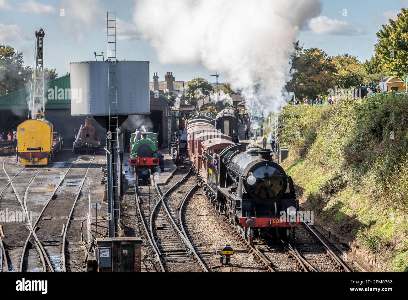 Southern 'S15' 4-6-0 No. 506 departs from Ropley station with a mixed freight, Watercress line, Hampshire Stock Photo