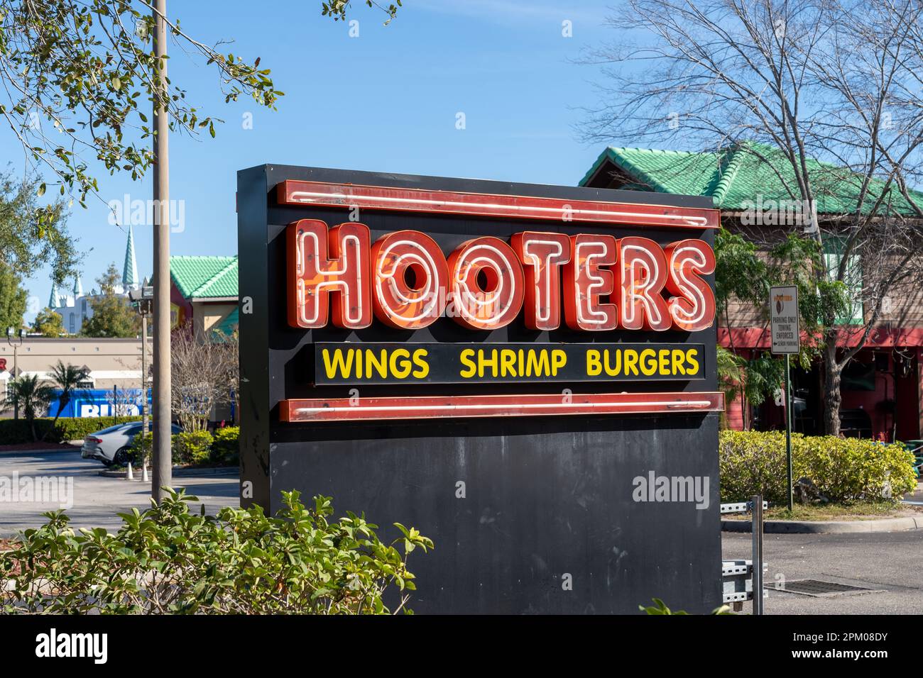 Orlando, FL, USA - January 6, 2022: A Hooters restaurant sign is shown in Orlando, FL, USA. Stock Photo