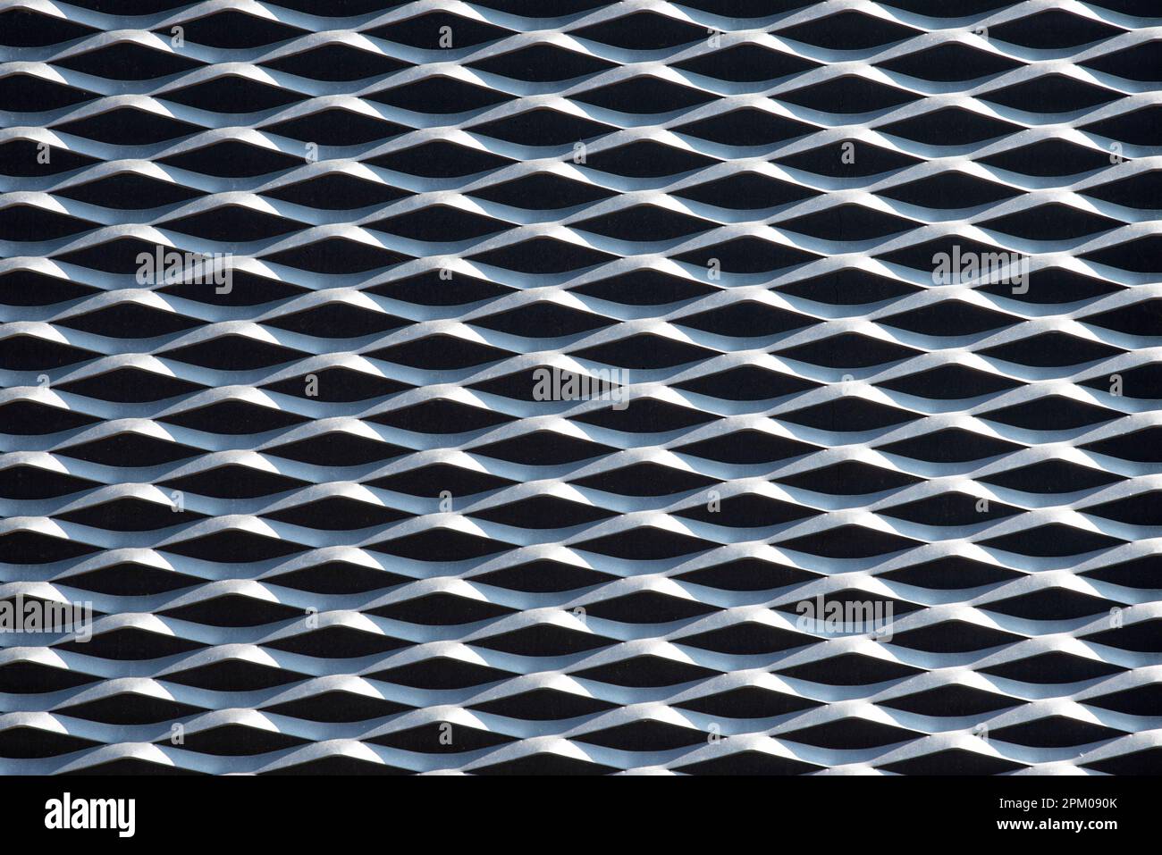 embossed triangular metal fence texture Stock Photo