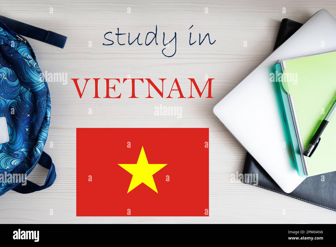Study in Vietnam. Background with notepad, laptop and backpack