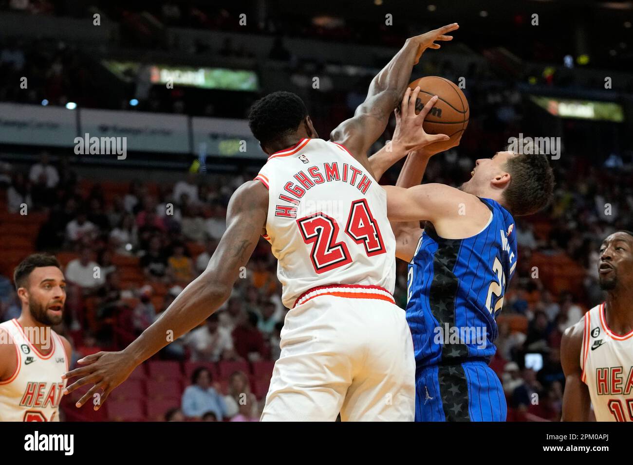 Miami Heat forward Haywood Highsmith (24) grabs a rebound during the first  half of an NBA basketball game against the Detroit Pistons, Tuesday, Dec.  6, 2022, in Miami. (AP Photo/Lynne Sladky Stock