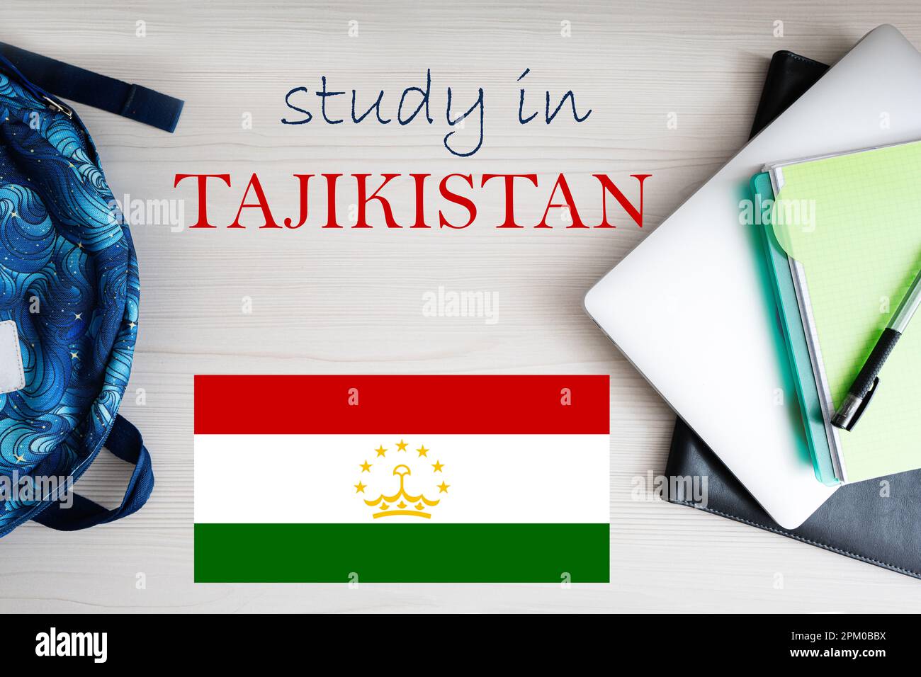 Study in Tajikistan. Background with notepad, laptop and backpack