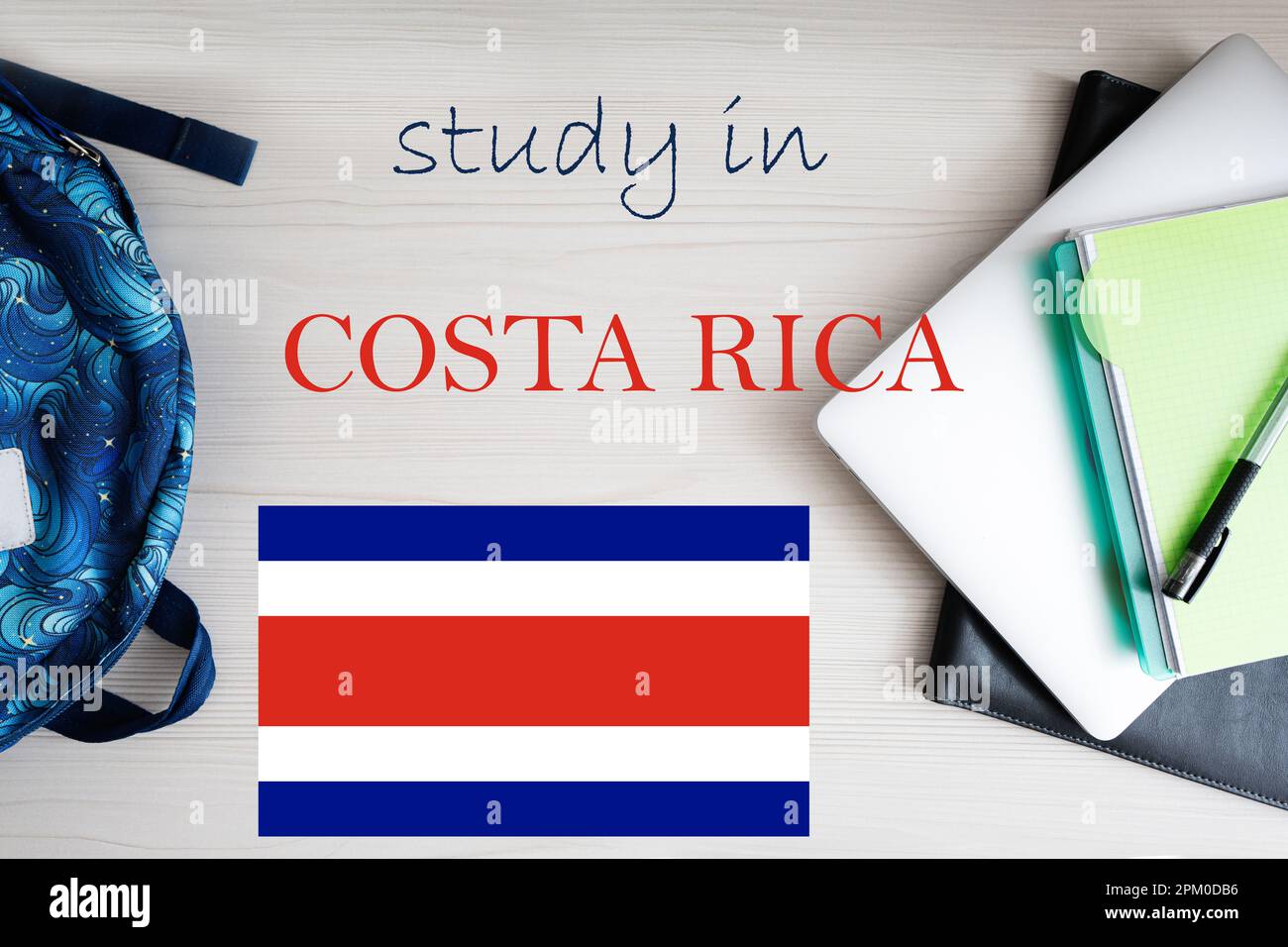Study in Costa Rica. Background with notepad, laptop and backpack. Education concept. Stock Photo