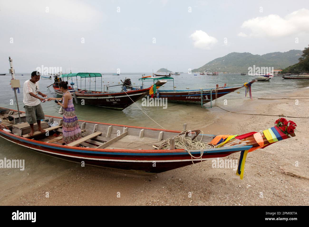 Tour Boat at the Beach and Landscape of Sairee Beach at the Town of Sairee Village on the Ko Tao Island in the Province of Surat Thani in Thailand,  T Stock Photo