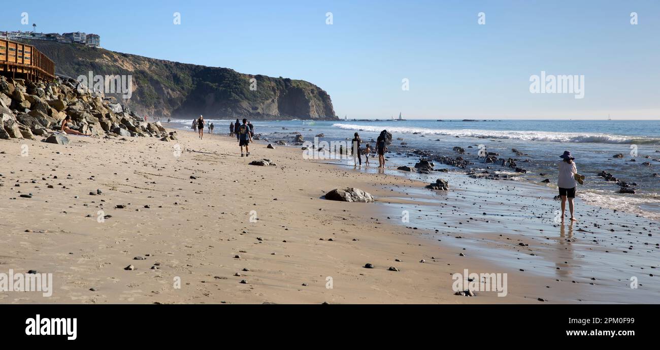Strand Beach at low tide in Dana Point, Orange County, Southern California with Dana Point Headlands Conservation Area in the background. Stock Photo