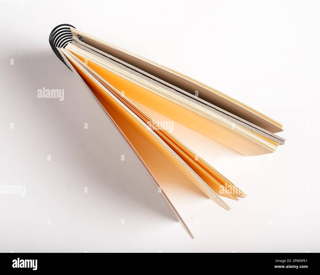 top view of a sketchbook with colored pencils arranged around on white  background Stock Photo by stoockking