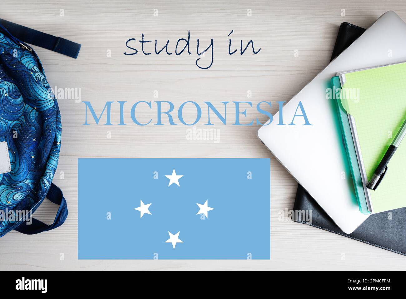 Study in Micronesia. Background with notepad, laptop and backpack