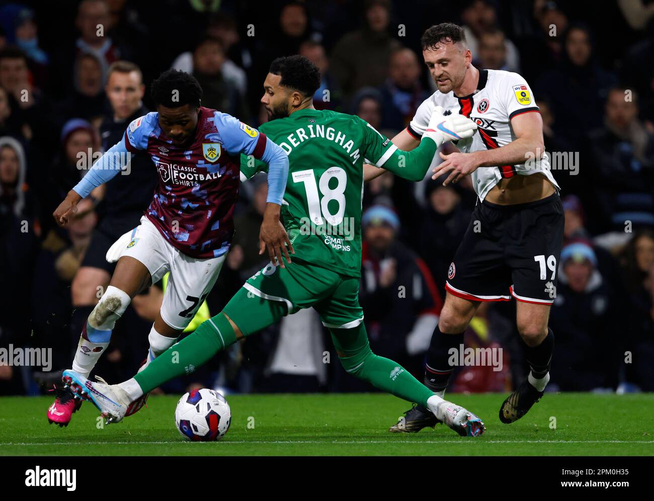 Sheffield United goalkeeper Wes Foderingham fouls Burnley's Nathan ...