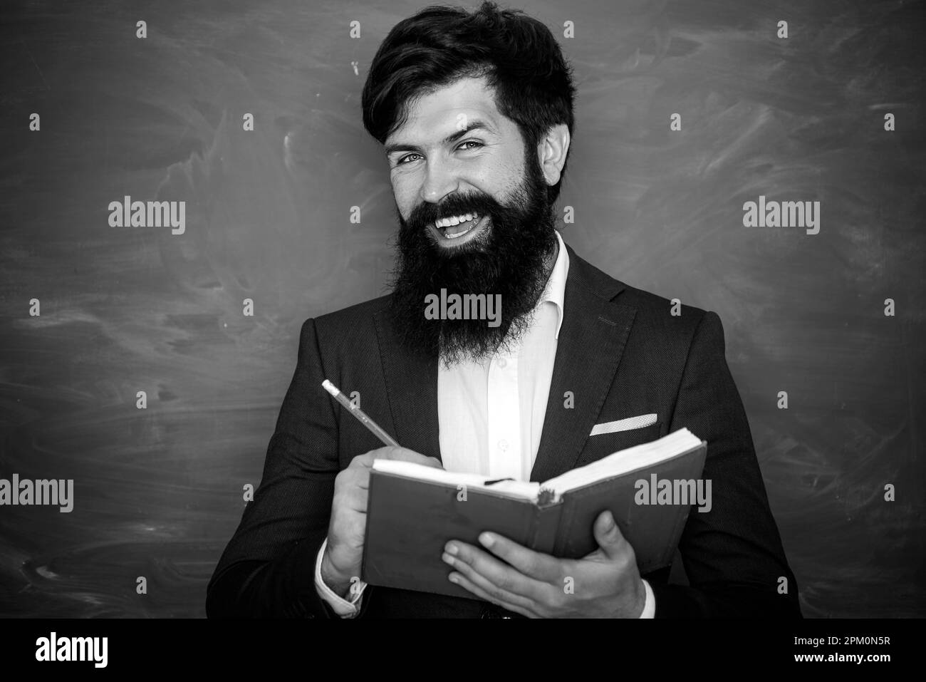 Bearded Professor At School Lesson At Desks In Classroom Education bearded-professor-at-school-lesson-at-desks-in-classroom-education