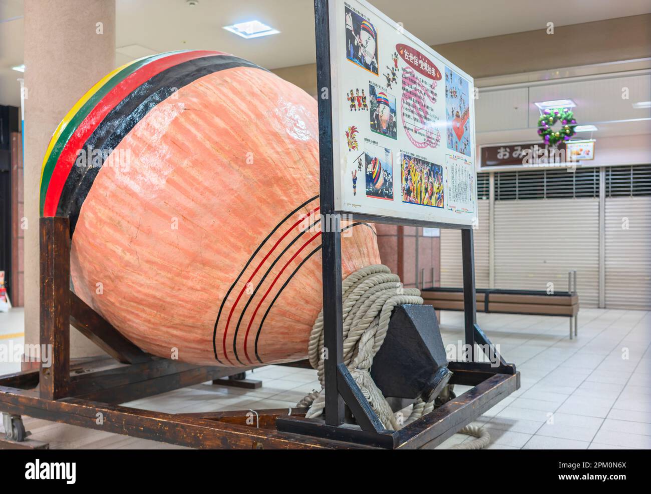 Sasebo Kyushu dec 08 2022 A giant Japanese wooden 200kg spinning top called Sasebo Goma with its yoma himo rope created in 1997 for the Kunchi fes Stock Photo Alamy