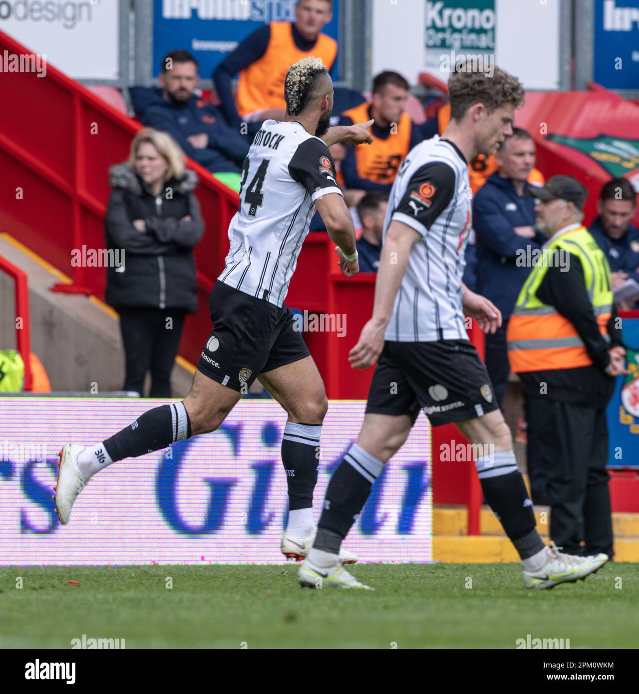 Wrexham, Wrexham County Borough, Wales, 10th April 2023.Notts County’s John Bostock celebrates his goal, during Wrexham Association Football Club V Notts County Football Club at The Racecourse Ground, in in the Vanarama National League. (Credit Image: ©Cody Froggatt/Alamy Live News) Stock Photo