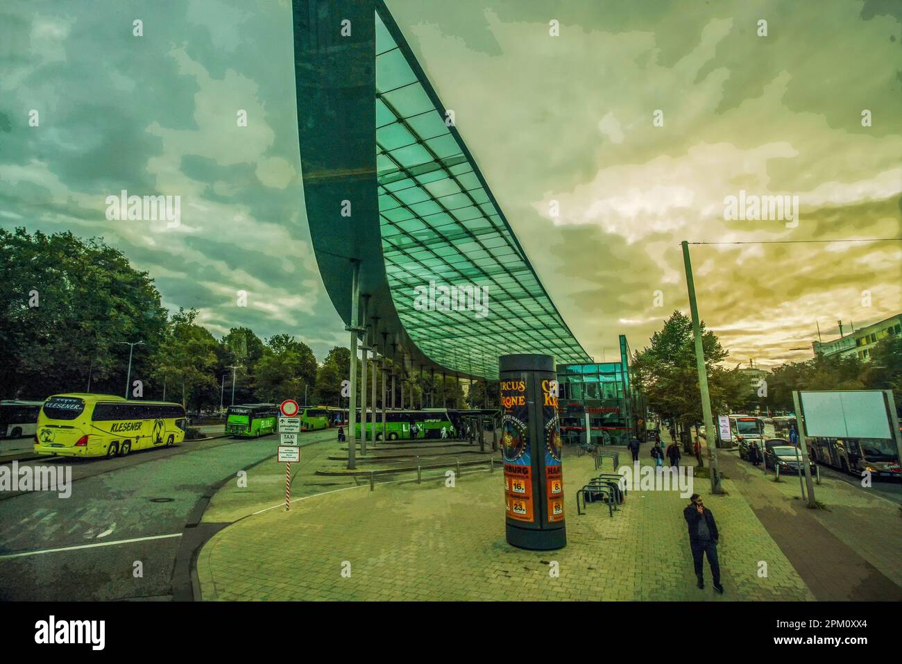 Modern building of Bus station in Hamburg in sunset time : dramatic sky ...