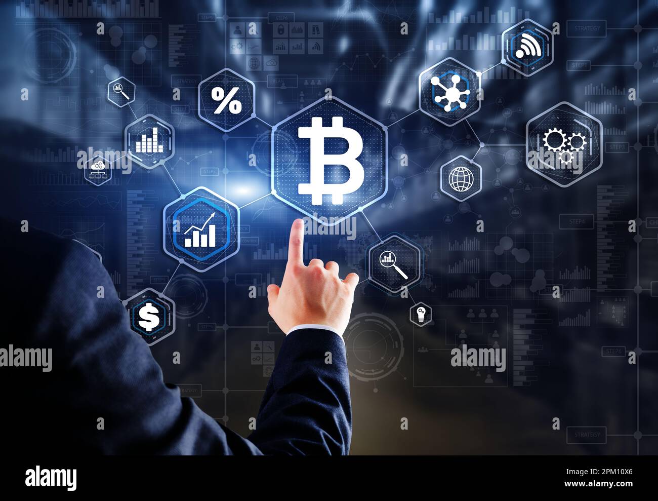 Man clicks on a virtual screen bitcoin icon. Stock Photo