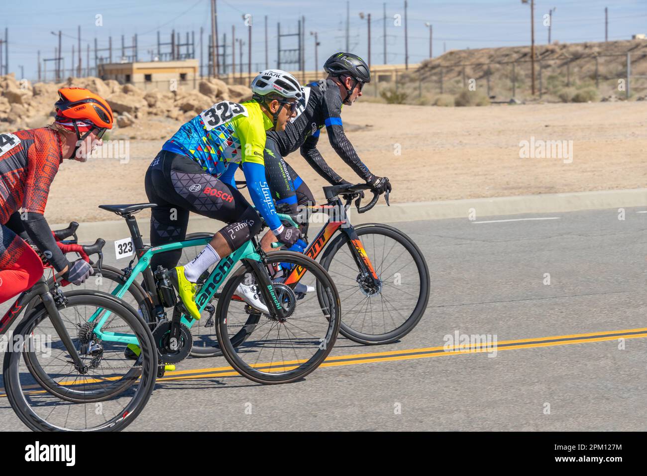 Victorville, CA, USA – March 25, 2023: Men’s senior cycling road race in the Majestic Cycling event held in Victorville, California. Stock Photo