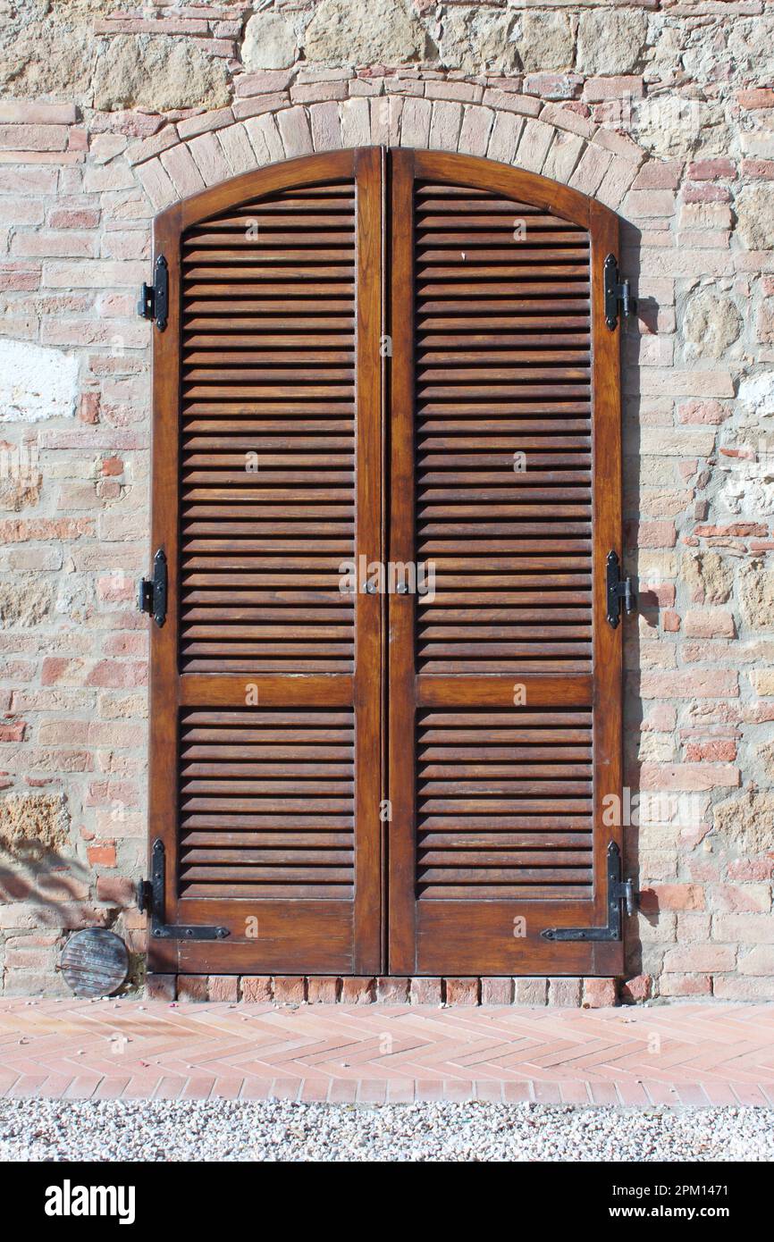 Italian style house entrance with shutters Stock Photo Alamy