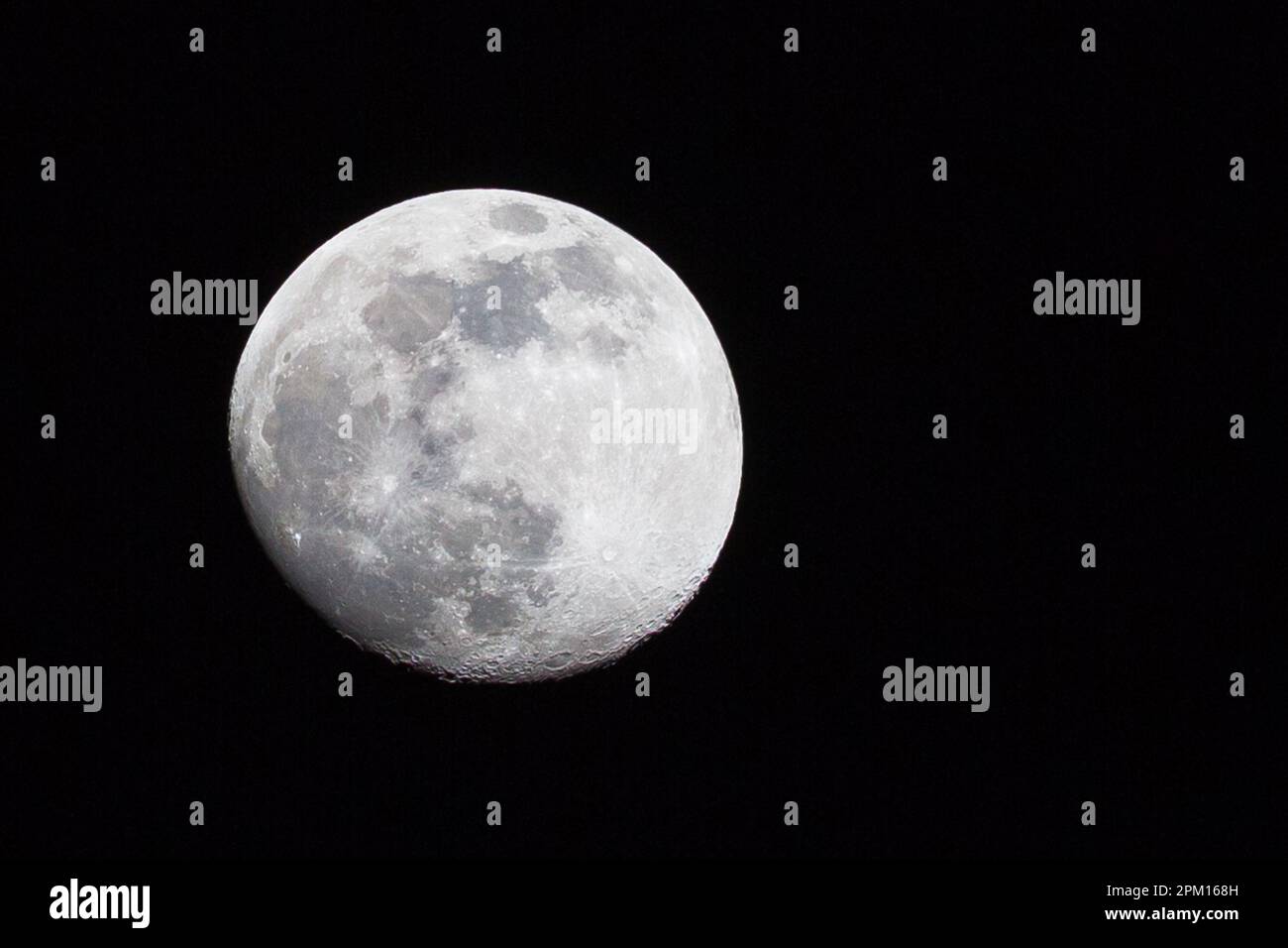 The Earth's Moon in Waxing Gibbous phase with craters visible against a