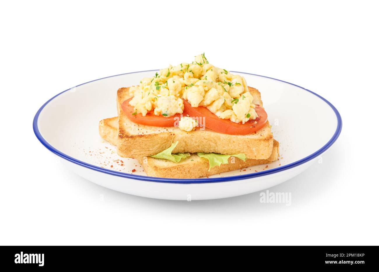 Plate with tasty scrambled eggs sandwich on white background Stock ...